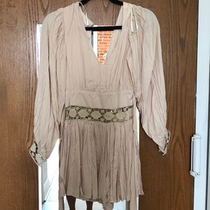 Unworn Long sleeve cream romper